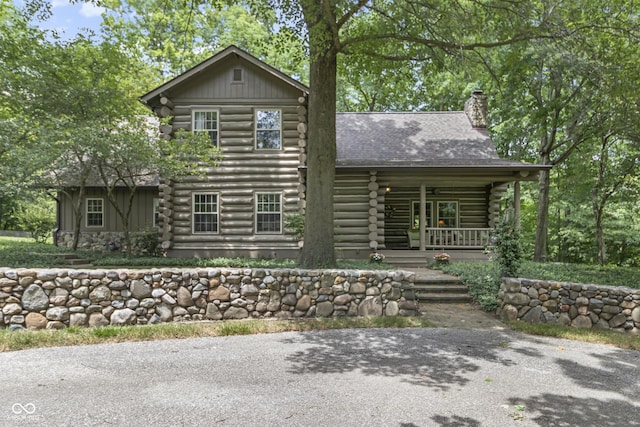 log home with a porch