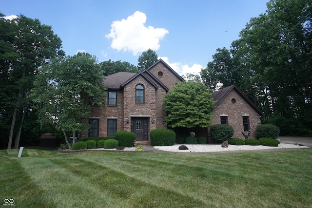 view of front of home with a front lawn