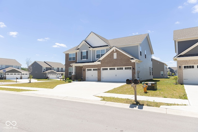 view of front of house featuring a garage and a front lawn