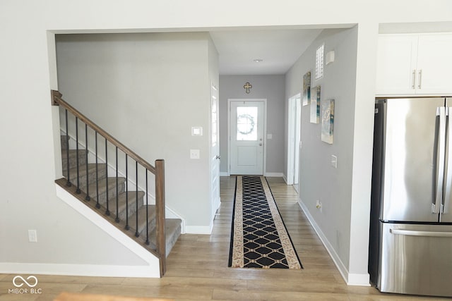 entrance foyer featuring light wood-type flooring