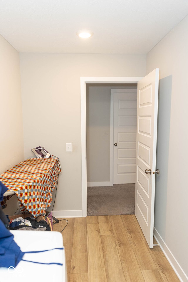 bedroom with hardwood / wood-style flooring