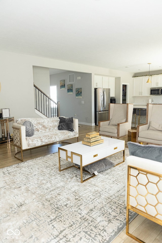 living room with hardwood / wood-style flooring