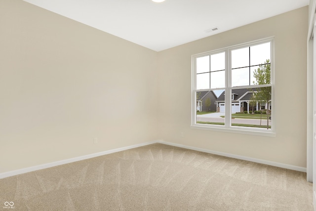 view of carpeted spare room