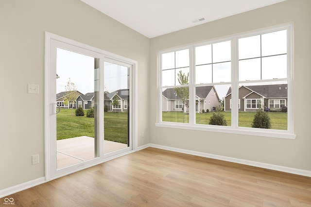 entryway with light hardwood / wood-style floors