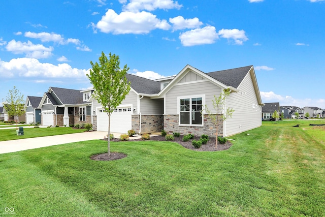 view of front facade featuring a front lawn and a garage