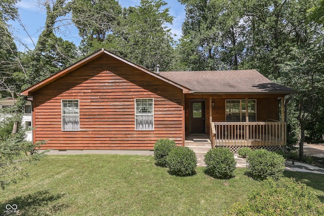 view of front of home with a porch and a front lawn