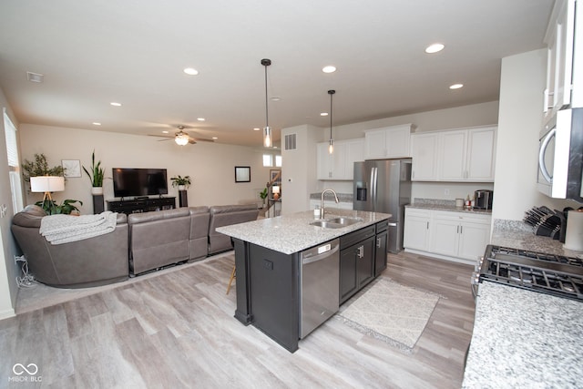 6748 Fallen Leaf Dr, Whitestown, IN 46075 - kitchen featuring stainless steel appliances, a sink, white cabinetry, a ceiling fan, and recessed lighting