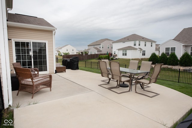 6748 Fallen Leaf Dr, Whitestown, IN 46075 - view of patio with a residential view, outdoor dining area, and a grill
