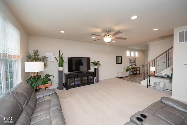 6748 Fallen Leaf Dr, Whitestown, IN 46075 - living room with recessed lighting, carpet floors, a ceiling fan, and stairway