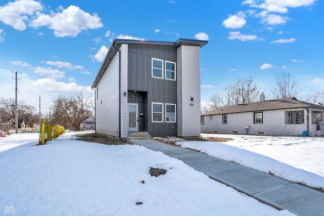 view of snow covered property