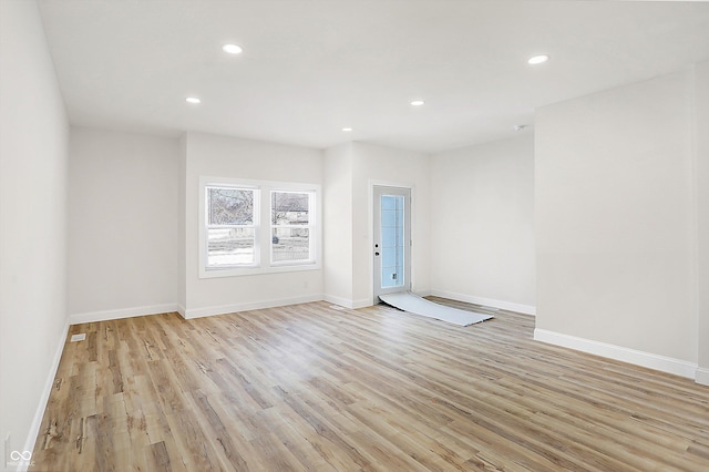 empty room featuring light hardwood / wood-style floors