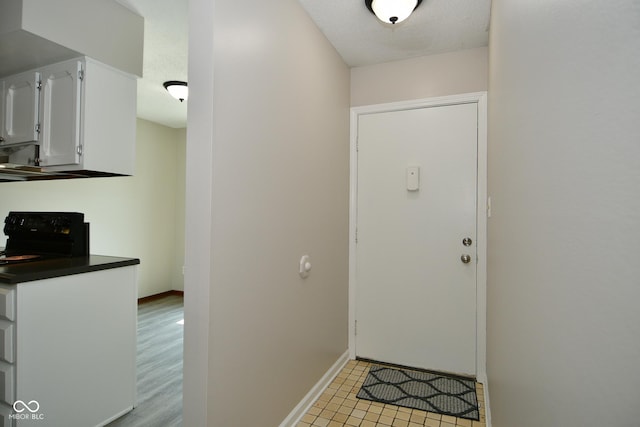 entrance foyer with a textured ceiling