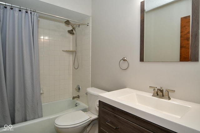 full bathroom featuring vanity, shower / bathtub combination with curtain, and toilet