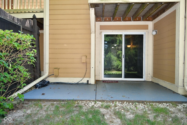 doorway to property featuring a patio