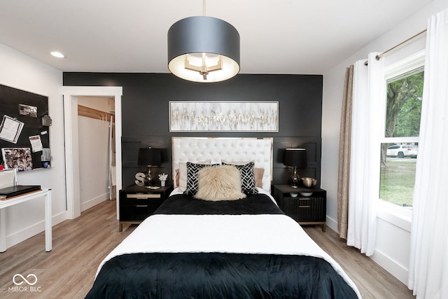 bedroom featuring light hardwood / wood-style flooring