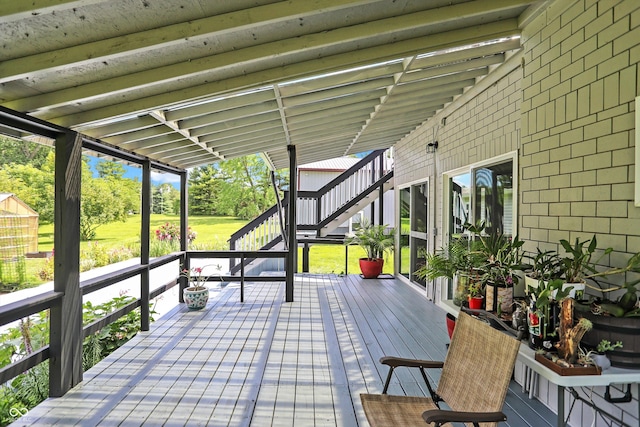 deck featuring stairway