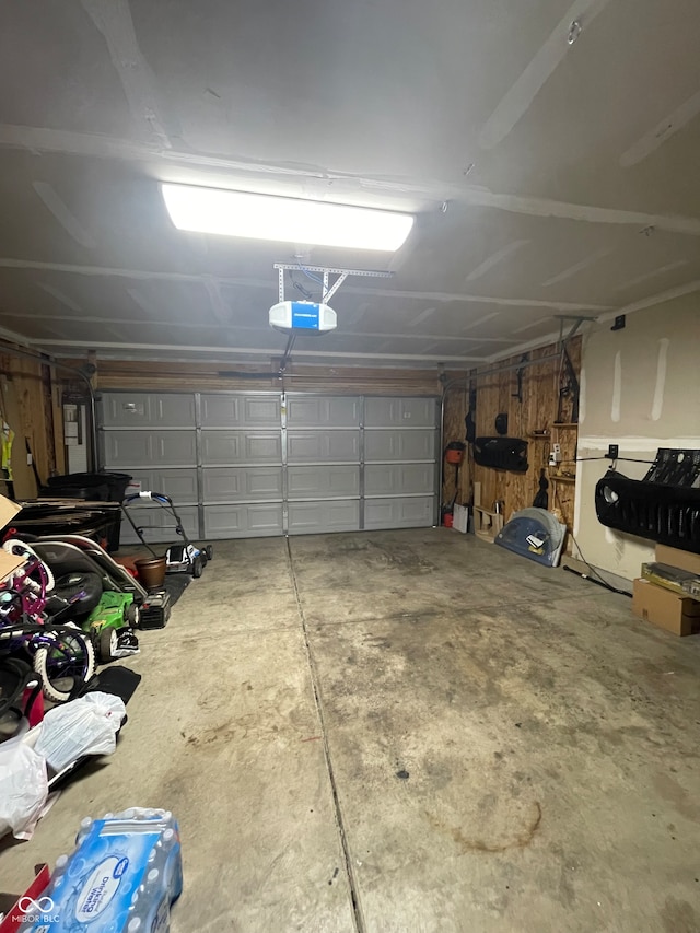 garage featuring a garage door opener