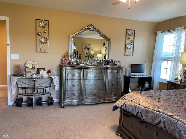 bedroom with carpet flooring and ceiling fan