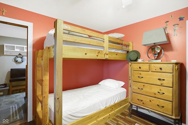 bedroom featuring hardwood / wood-style flooring