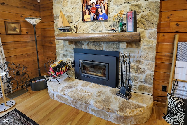 details featuring a fireplace and hardwood / wood-style floors