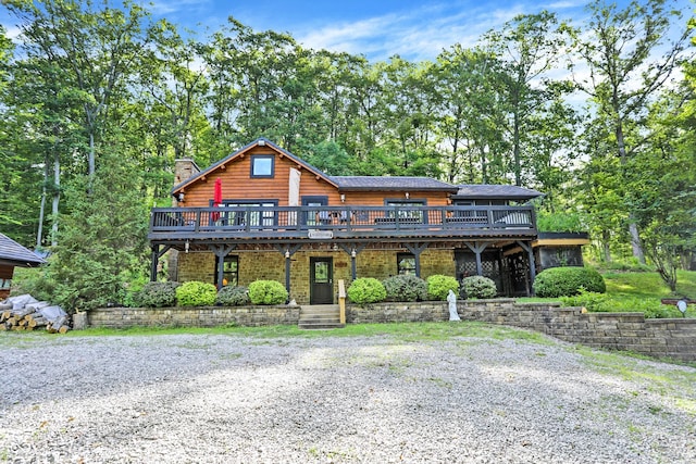 view of front of house featuring a deck