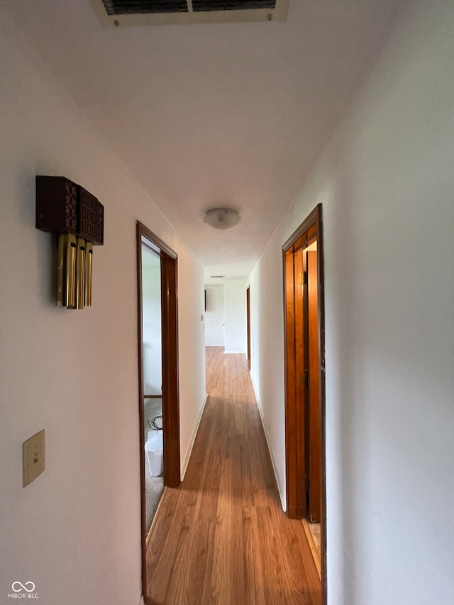 hall featuring light hardwood / wood-style flooring