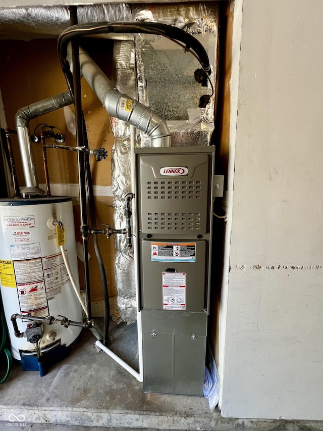 utility room with gas water heater