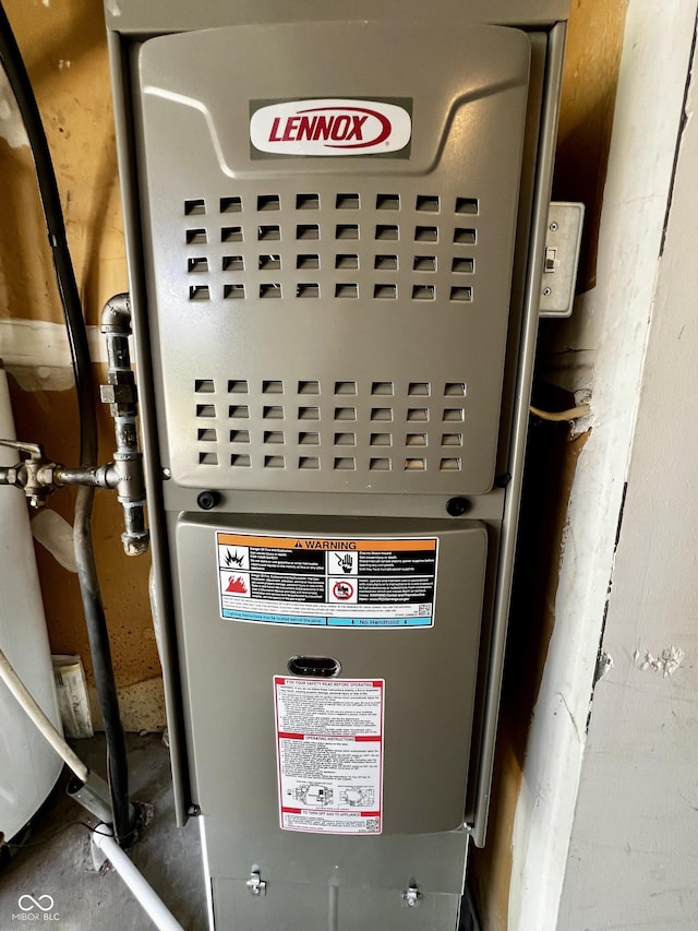 utility room with heating unit