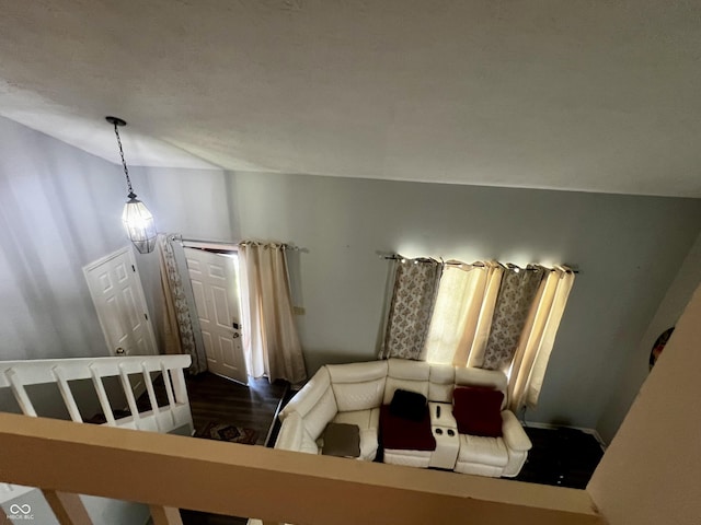 bedroom with dark hardwood / wood-style flooring