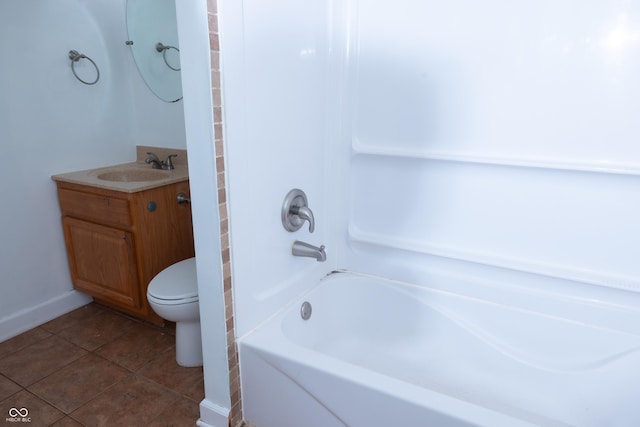 full bathroom with shower / tub combination, toilet, vanity, and tile patterned flooring