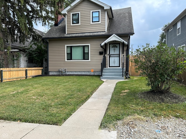 view of front of house featuring a front lawn