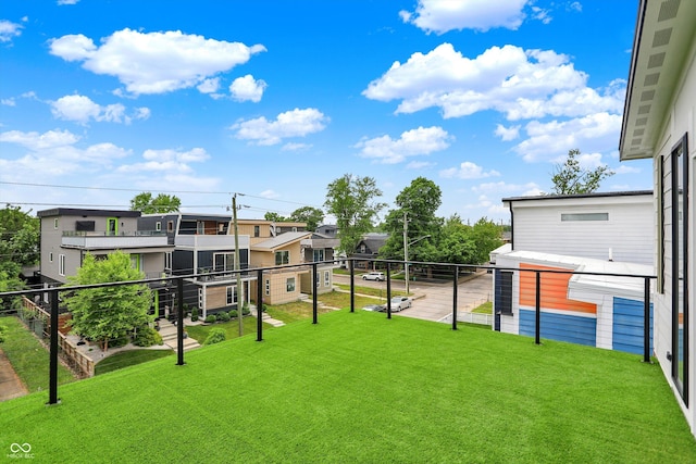 1218 Orange St, Indianapolis, IN 46203 - view of grassy yard featuring a balcony and a residential view
