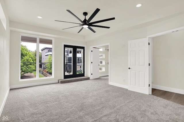 1218 Orange St, Indianapolis, IN 46203 - carpeted spare room featuring ceiling fan, baseboards, and recessed lighting