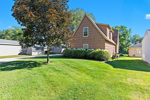 view of home's exterior featuring a lawn