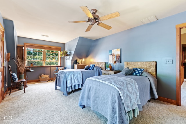 bedroom featuring ceiling fan and light colored carpet