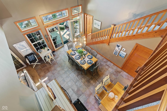 living room featuring a high ceiling