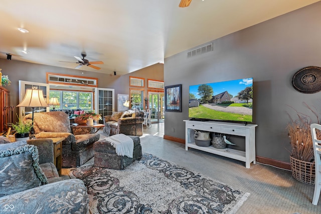 carpeted living room with ceiling fan