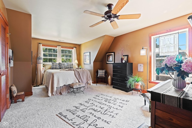 carpeted bedroom with ceiling fan