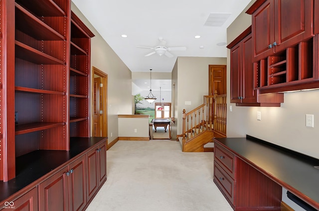 interior space featuring light colored carpet