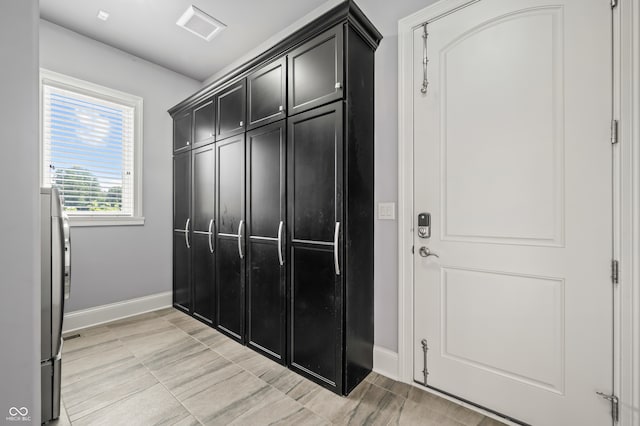 interior space with light tile patterned floors