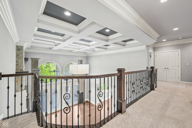 corridor with light colored carpet, beamed ceiling, crown molding, and coffered ceiling