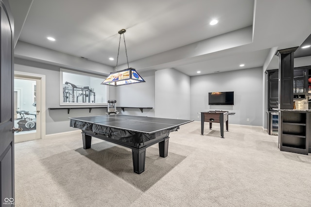 recreation room featuring light colored carpet