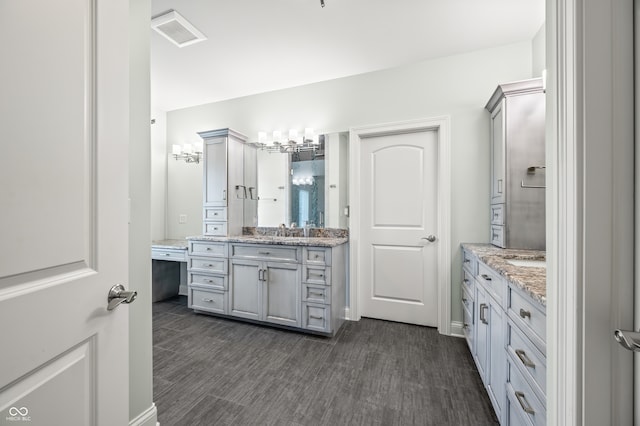 bathroom featuring double vanity