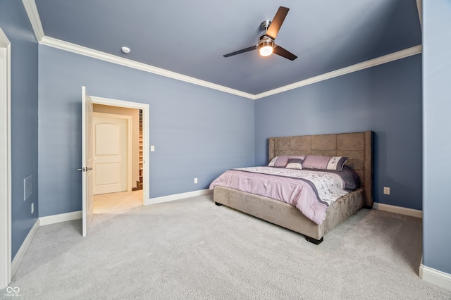 bedroom featuring ceiling fan, carpet flooring, and ornamental molding