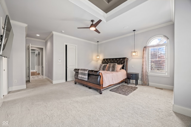 bedroom featuring ceiling fan, ornamental molding, and light colored carpet