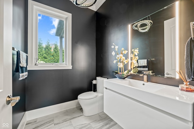 bathroom with vanity, toilet, and tile patterned flooring