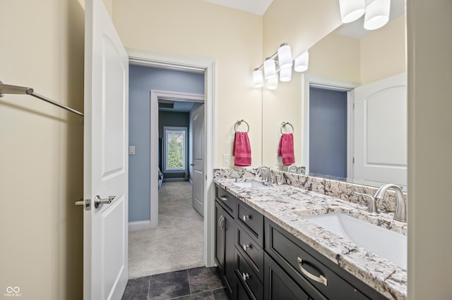 bathroom featuring tile patterned floors and double sink vanity