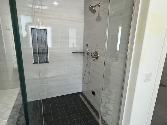 bathroom featuring an enclosed shower