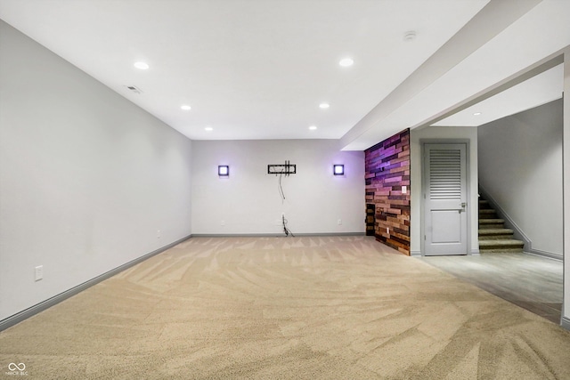 empty room featuring light carpet