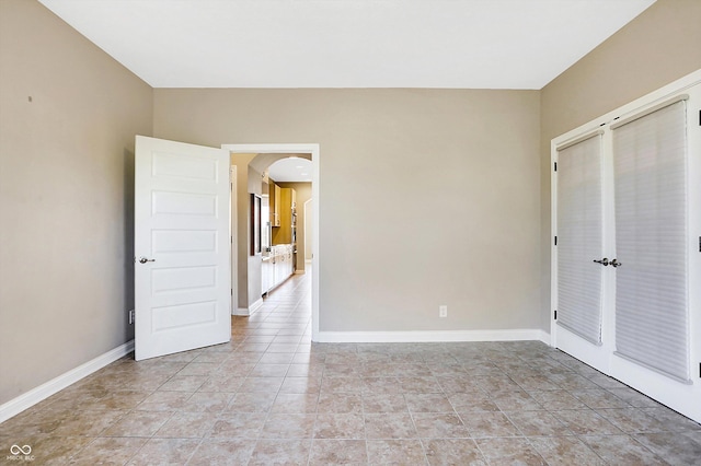 unfurnished bedroom with a closet